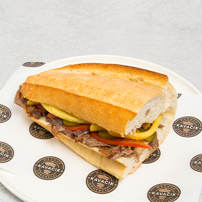 a Reuben sandwich on wax paper.